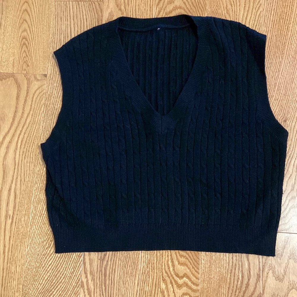 Black cabled v neck vest